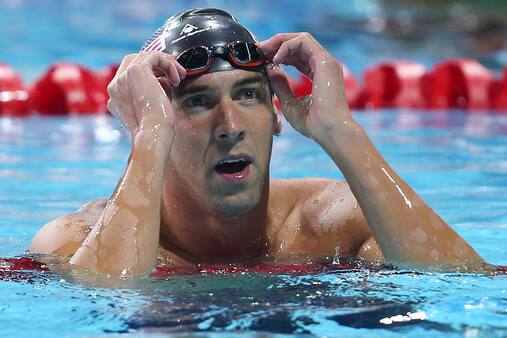Phelps åbner OL med stil - 23. OL-medalje er hjemme